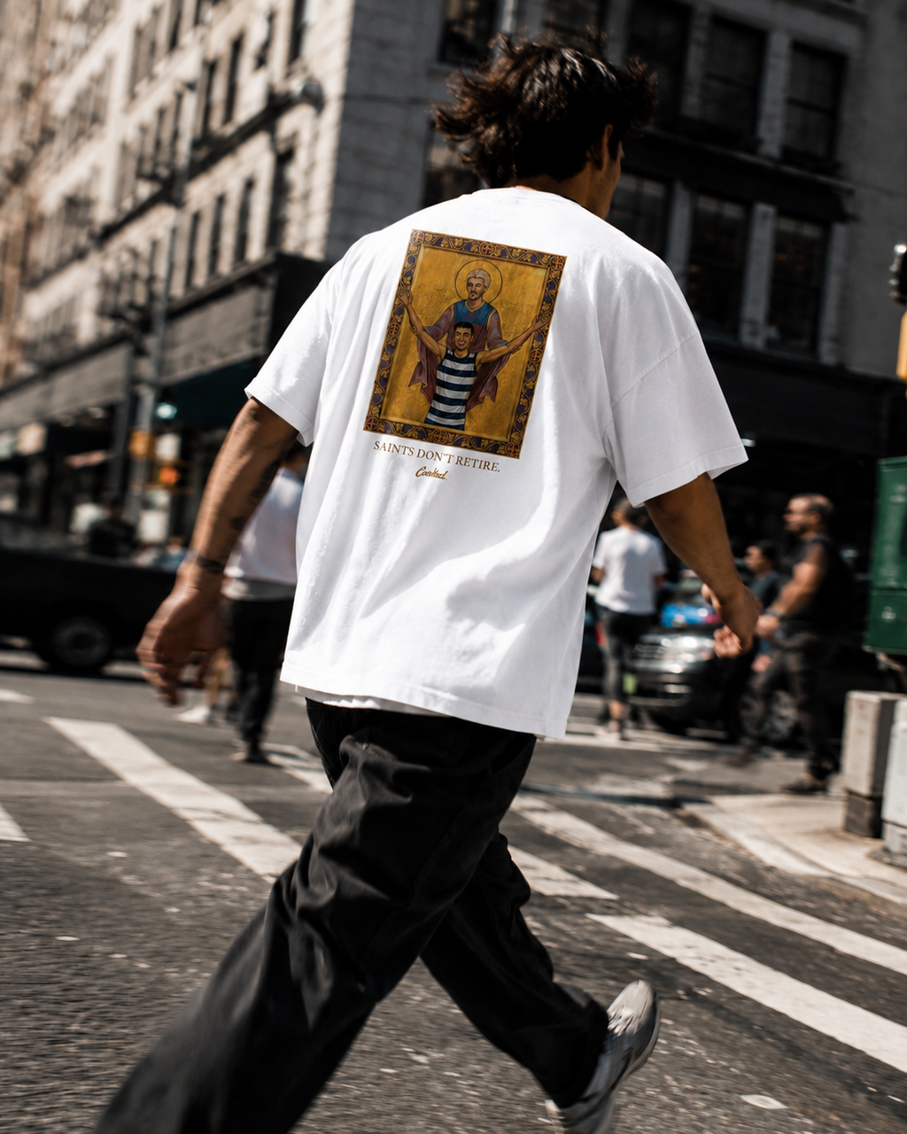 LIVES FOREVER — Cooked 001 on white tee variant, kitchen setting.