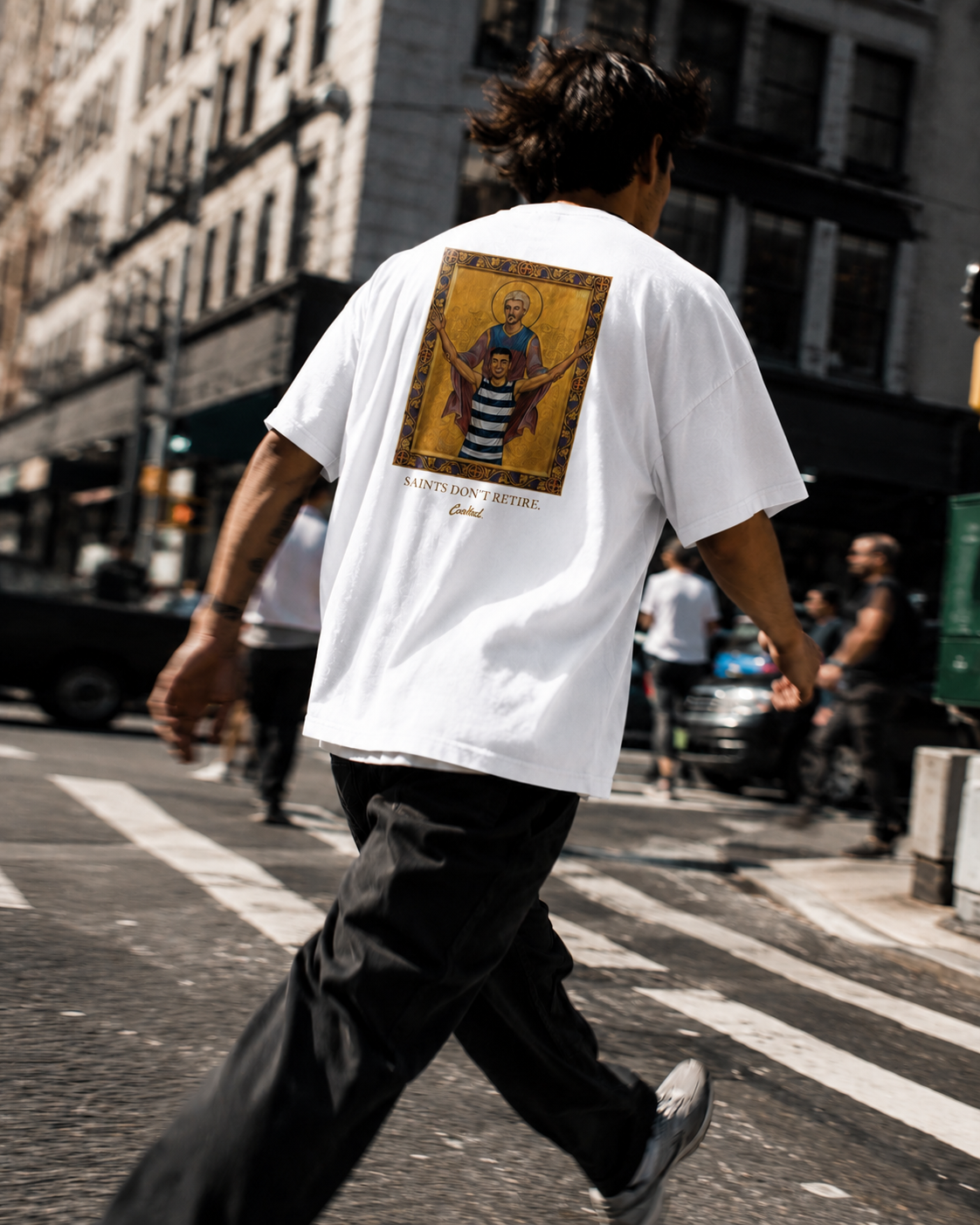 LIVES FOREVER — Cooked 001 on white tee variant, kitchen setting.